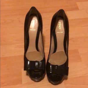 Fendi black patent leather open toe pumps.